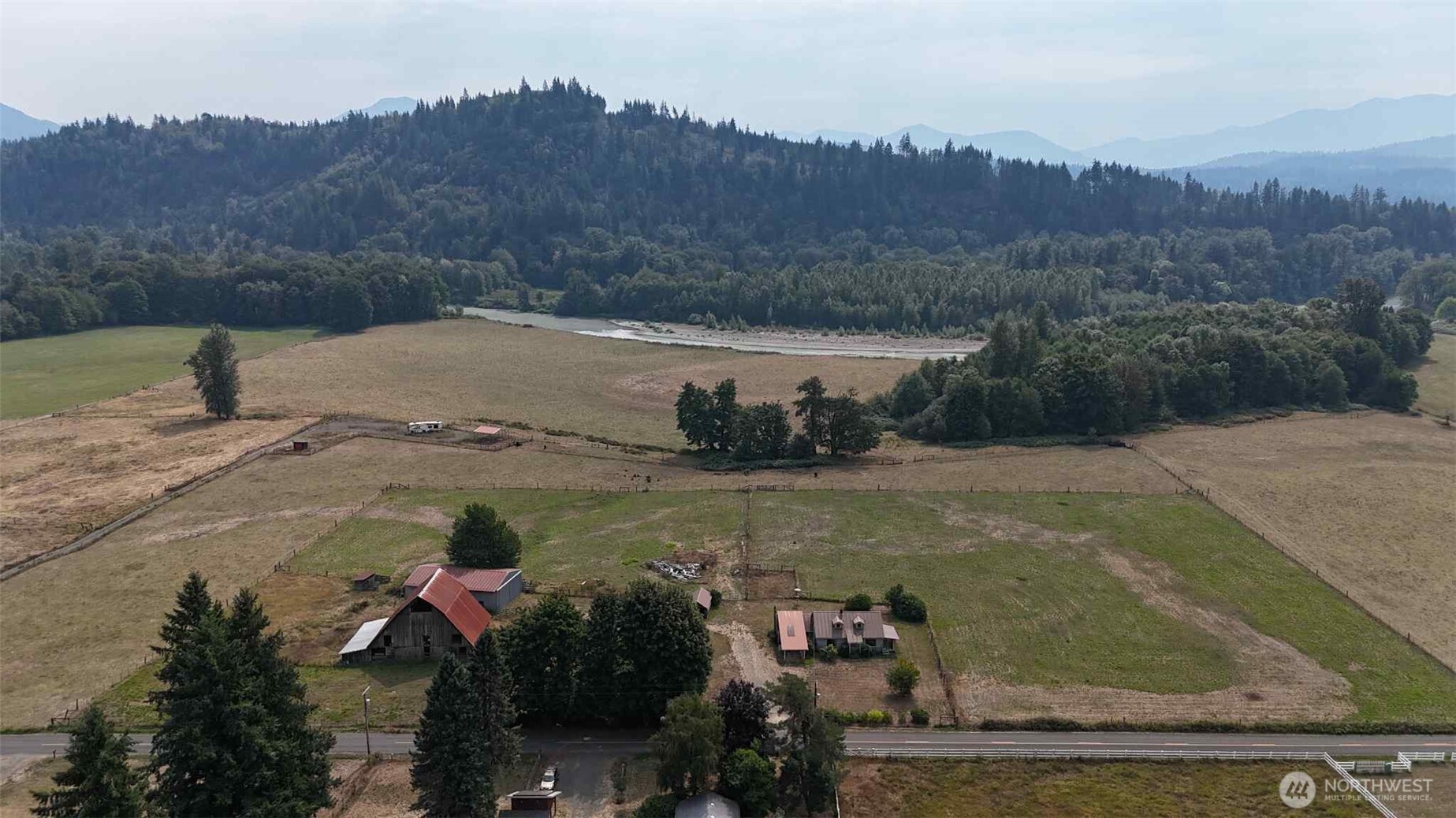 215 Kehoe Road Randle, WA 98377 - Photo 3 of 11 a view of a town with mountains in the background