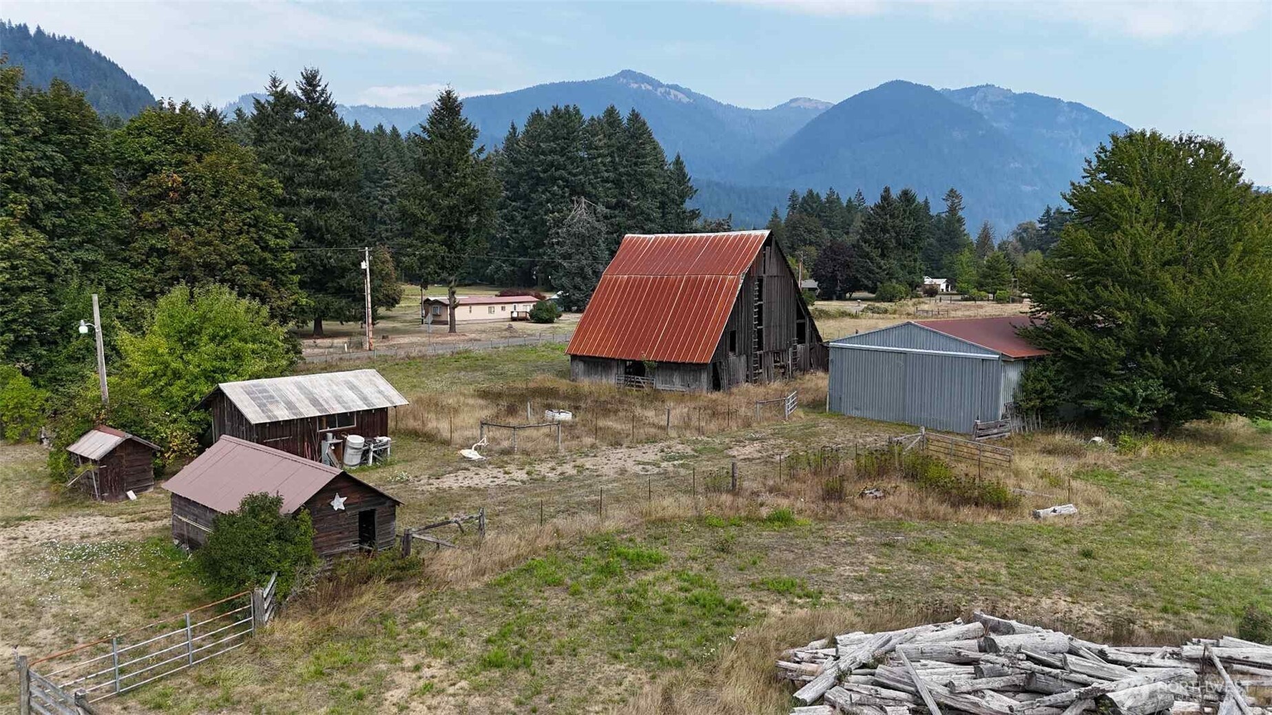 215 Kehoe Road Randle, WA 98377 - Photo 5 of 11 a backyard of a house with table and chairs