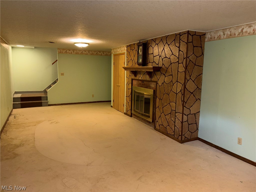 6308 Coen Road Vermilion, OH 44089 - Photo 31 of 40 basement fireplace