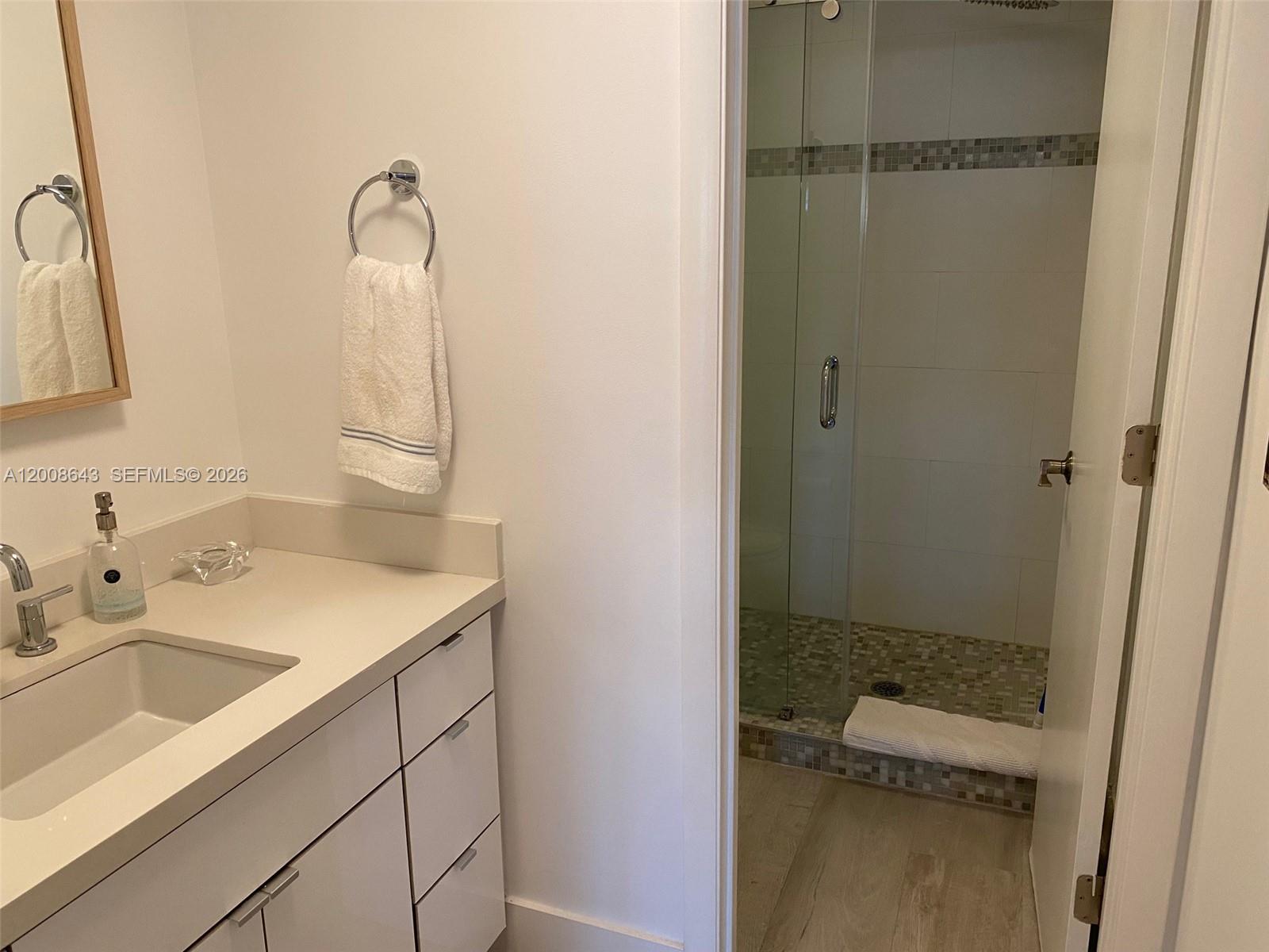 881 Ocean Drive, Unit TH12 Key Biscayne, FL 33149 - Photo 9 of 18 Downstairs full bath.