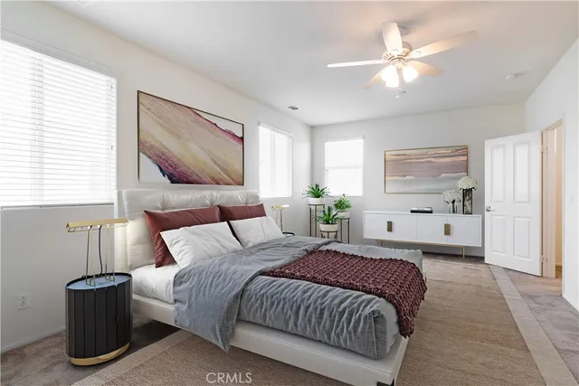 a bathroom with a sink mirror and a shower