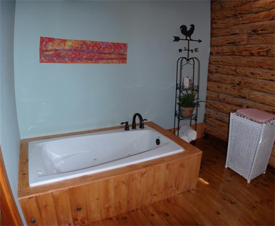 84 Searle Road Huntington, MA 01050 - Photo 15 of 28 a bath tub sitting next to a bathroom