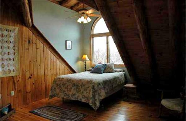 84 Searle Road Huntington, MA 01050 - Photo 18 of 28 a bedroom with a bed and wooden floor
