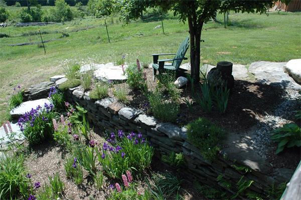 84 Searle Road Huntington, MA 01050 - Photo 25 of 28 a view of a garden with a lake
