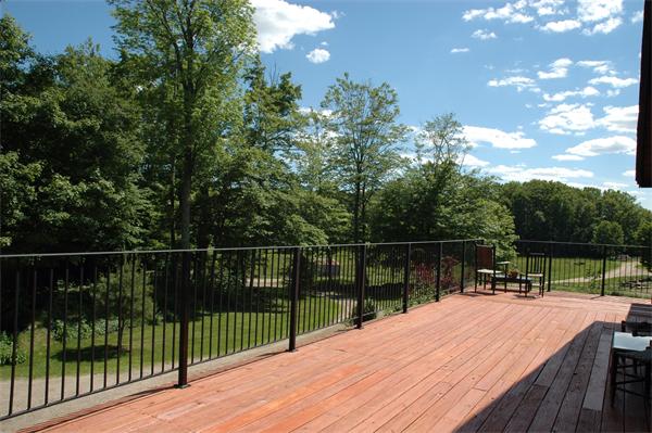 84 Searle Road Huntington, MA 01050 - Photo 5 of 28 a view of balcony with deck and outdoor seating