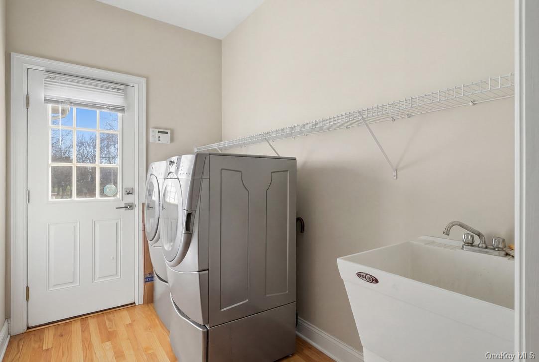 12 Feagles Road Warwick, NY 10990 - Photo 20 of 45 The laundry room on the main floor doubles as a mudroom and has access to the garage and yard.