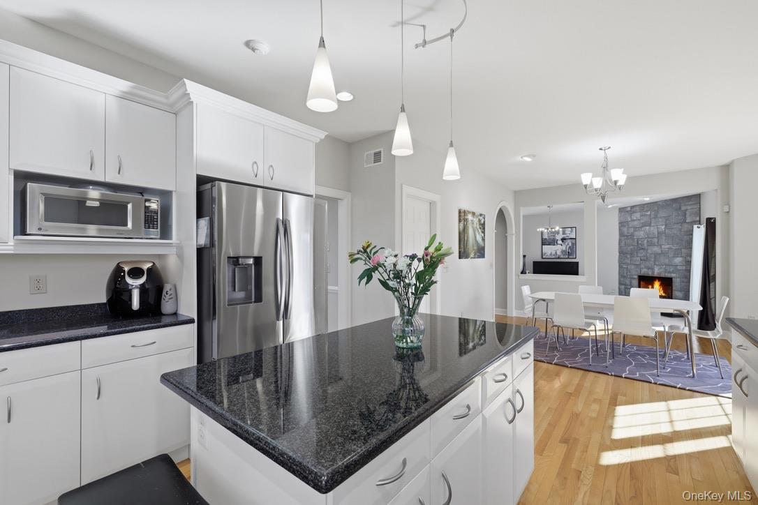 12 Feagles Road Warwick, NY 10990 - Photo 9 of 45 Timeless white cabinetry and granite counters grace the kitchen.