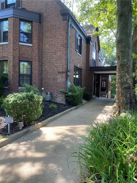 5420 Darlington Road Pittsburgh, PA 15217 - Photo 4 of 25 Covered entry way for guests to enter. Driveway continues to a heated, oversized 2-car automatic garage under the back deck. Also has a tool/garden room with a bathroom.