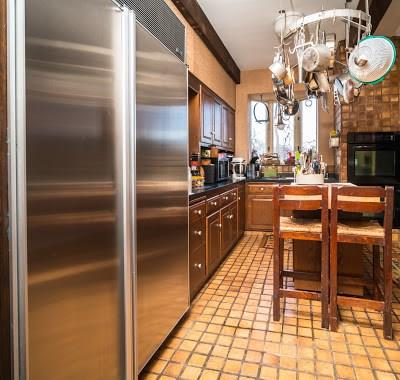 5420 Darlington Road Pittsburgh, PA 15217 - Photo 10 of 25 Sub zero refrigerator/freezer, built in convection oven, plenty of storage,and a hanging rack to add to the charm.