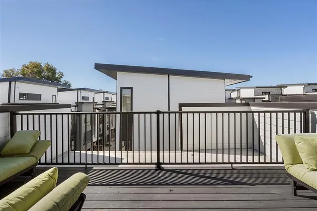 a balcony view with a chair