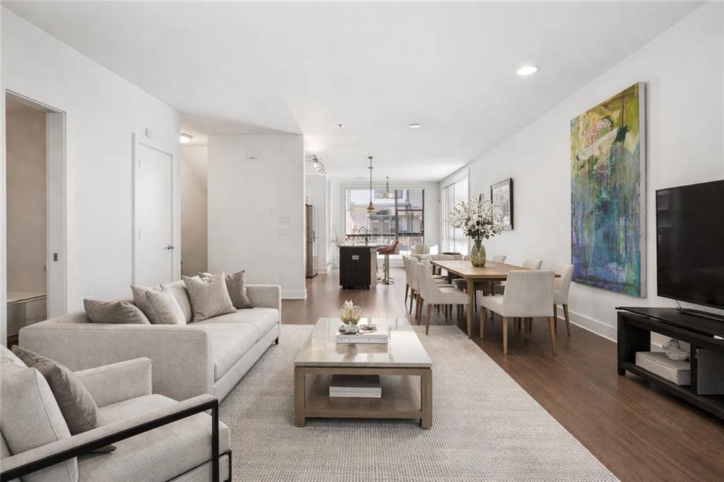 61 Moda Lane Atlanta, GA 30307 - Photo 32 of 39 a living room with furniture and a flat screen tv