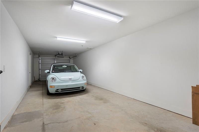 61 Moda Lane Atlanta, GA 30307 - Photo 37 of 39 a car parked in a parking