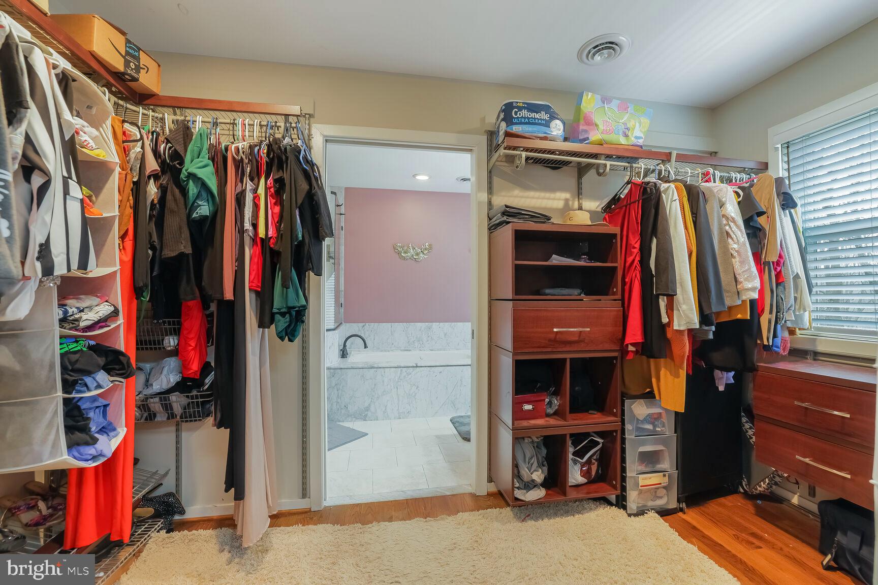 6231 Woodville Road Mount Airy, MD 21771 - Photo 18 of 29 a view of walk in closet with clothes and shoes