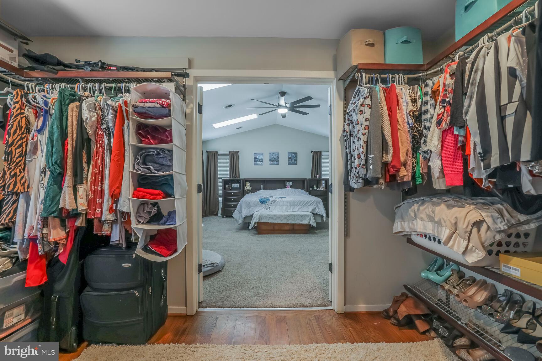6231 Woodville Road Mount Airy, MD 21771 - Photo 19 of 29 a view of walk in closet with clothes and shoes
