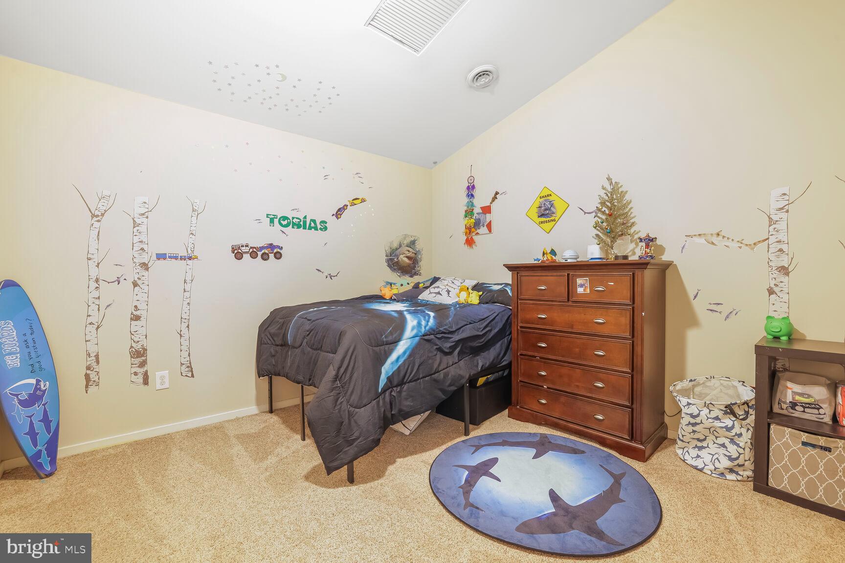 6231 Woodville Road Mount Airy, MD 21771 - Photo 25 of 29 a bedroom with a bed and furniture