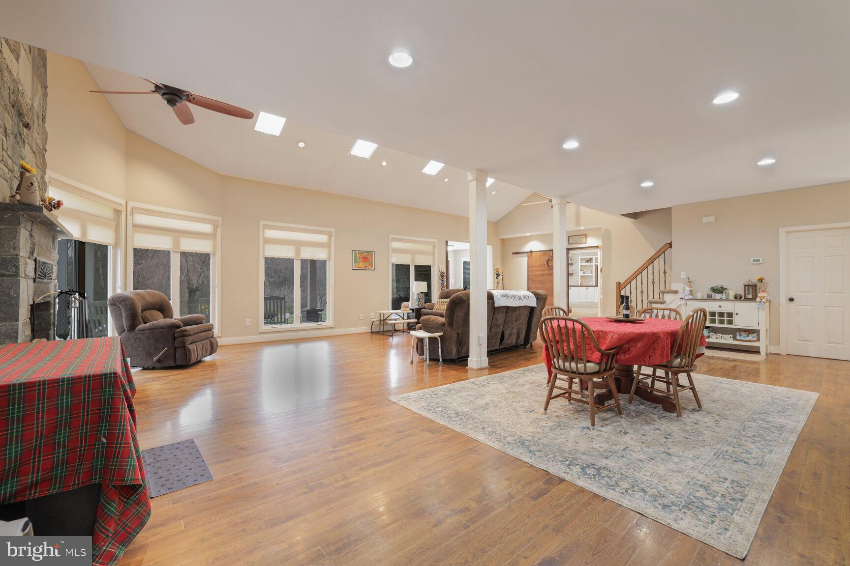 6231 Woodville Road Mount Airy, MD 21771 - Photo 3 of 29 a view of a living room and dining room