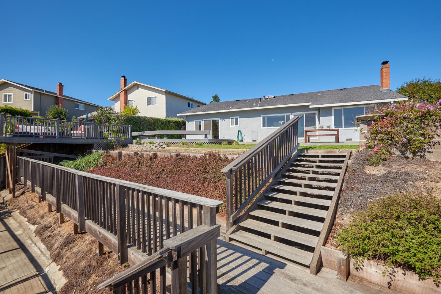 2516 Sherborne Drive Belmont, CA 94002 - Photo 21 of 25 a view of a house with wooden deck and a trees