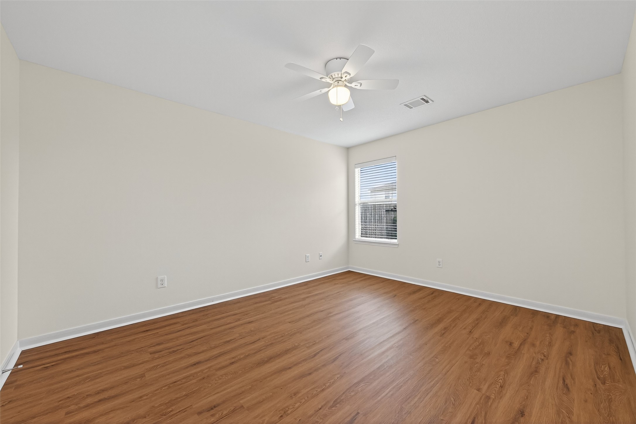4107 Pedernales River Lane Spring, TX 77386 - Photo 19 of 33 a view of an empty room with wooden floor