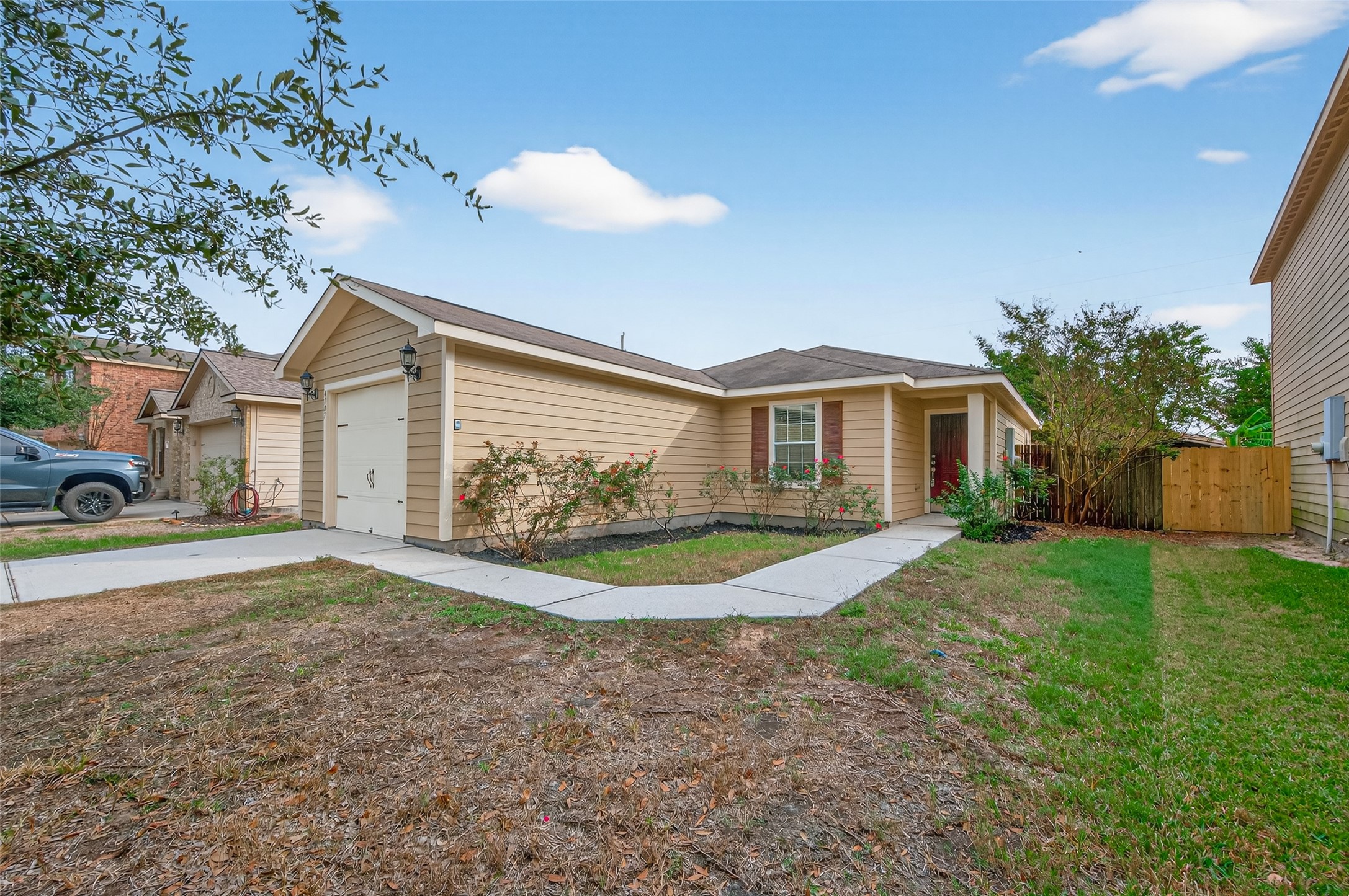 4107 Pedernales River Lane Spring, TX 77386 - Photo 2 of 33 a front view of a house with a yard and garage