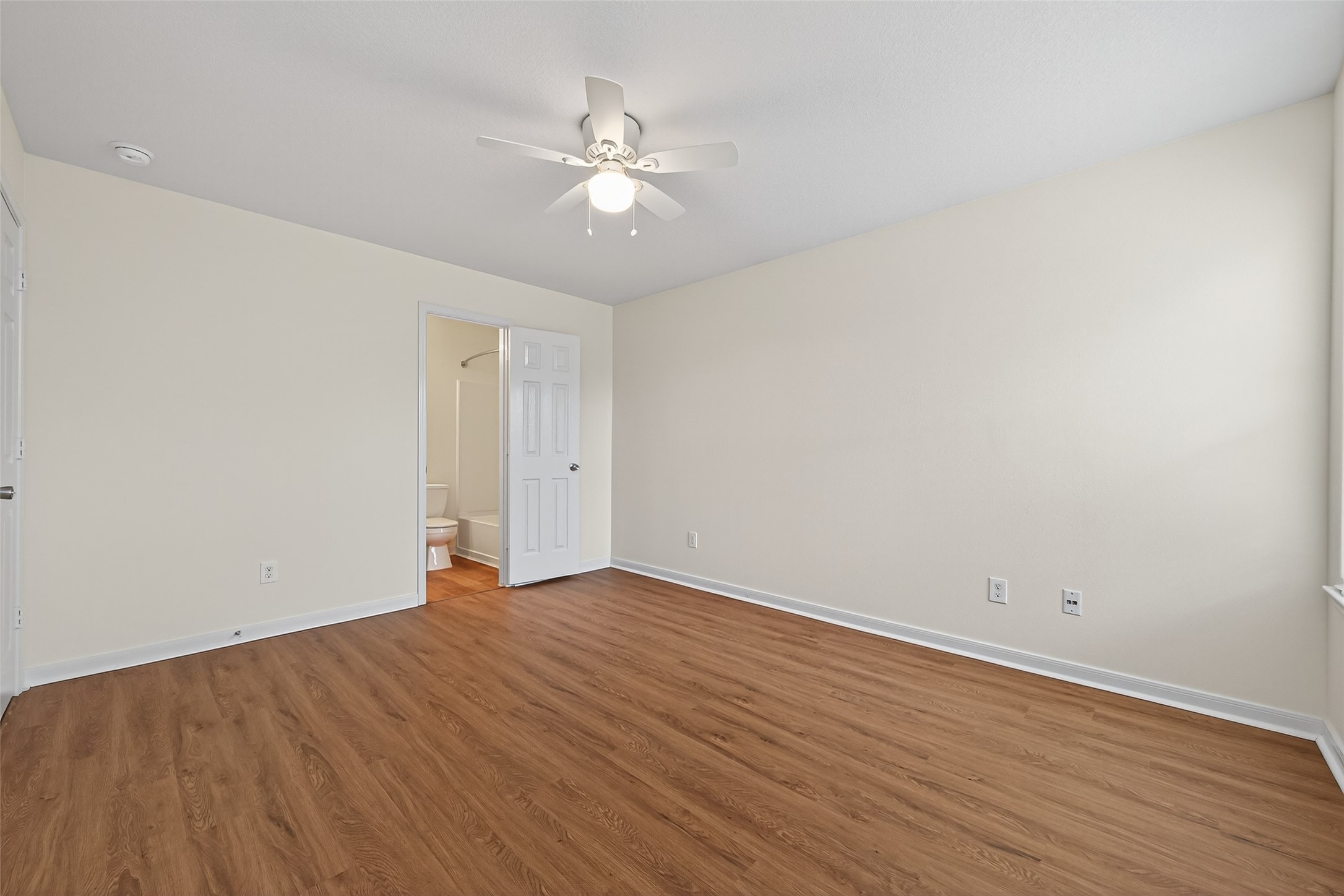 4107 Pedernales River Lane Spring, TX 77386 - Photo 22 of 33 a view of an empty room with wooden floor