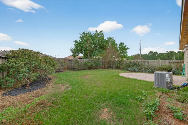 a view of a garden with a fountain