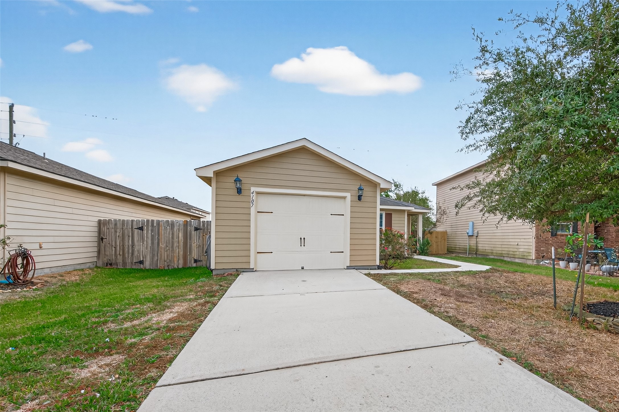 4107 Pedernales River Lane Spring, TX 77386 - Photo 4 of 33 a front view of a house with a yard and garage