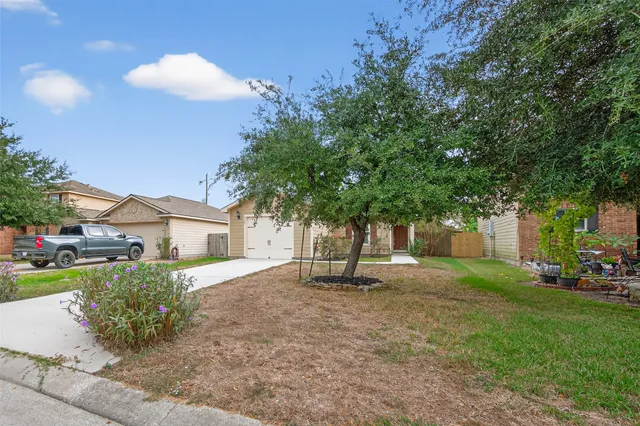 a house view with a backyard space