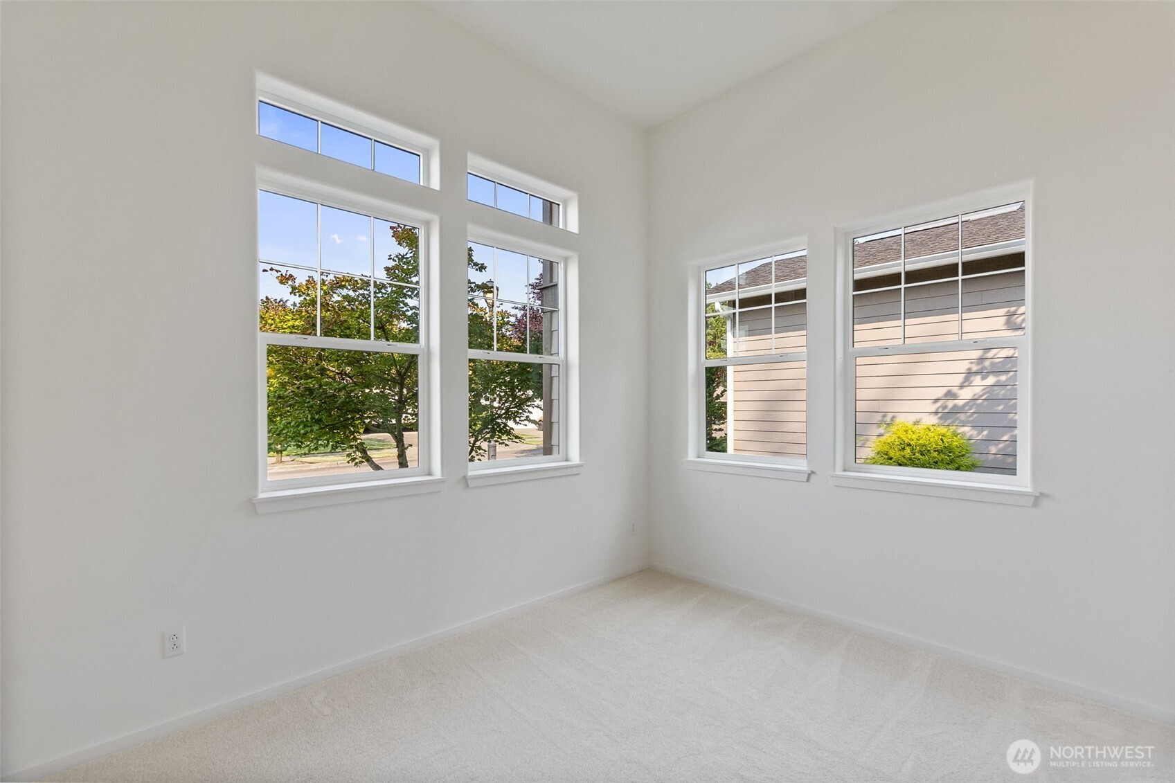 8231 Orcas Loop Northeast Lacey, WA 98516 - Photo 13 of 23 an empty room with windows