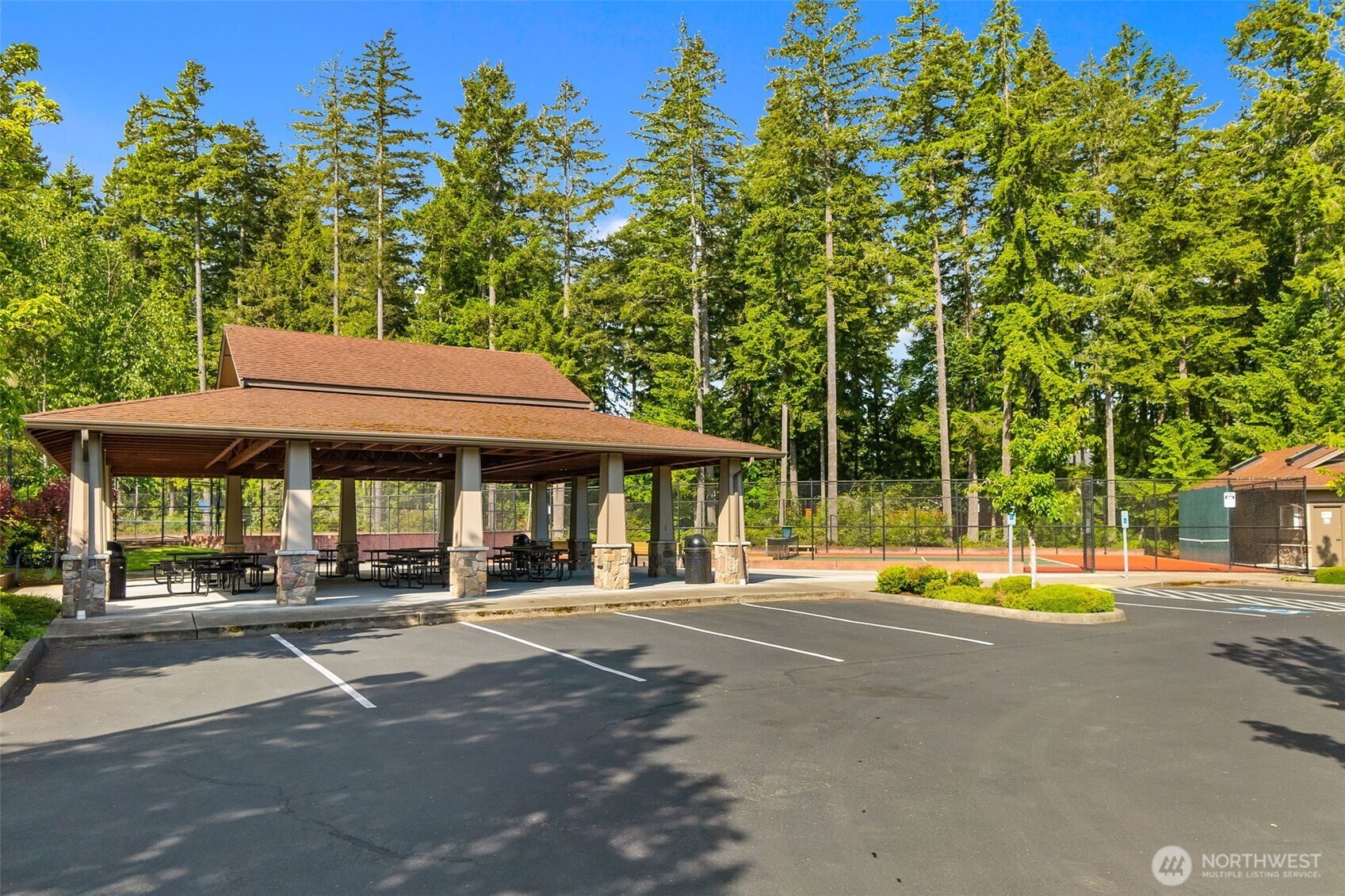8231 Orcas Loop Northeast Lacey, WA 98516 - Photo 17 of 23 a backyard of a house with basket ball court and outdoor seating