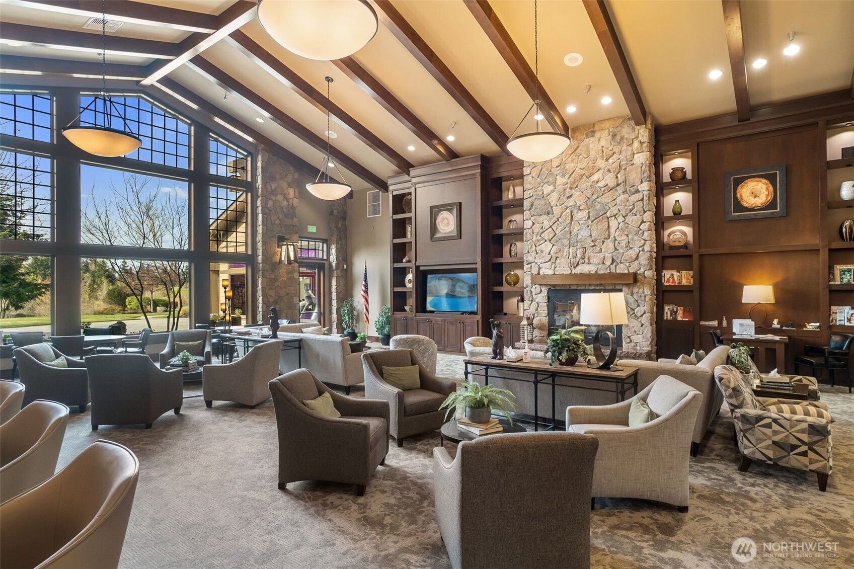 8231 Orcas Loop Northeast Lacey, WA 98516 - Photo 18 of 23 a living room with fireplace furniture and a large window
