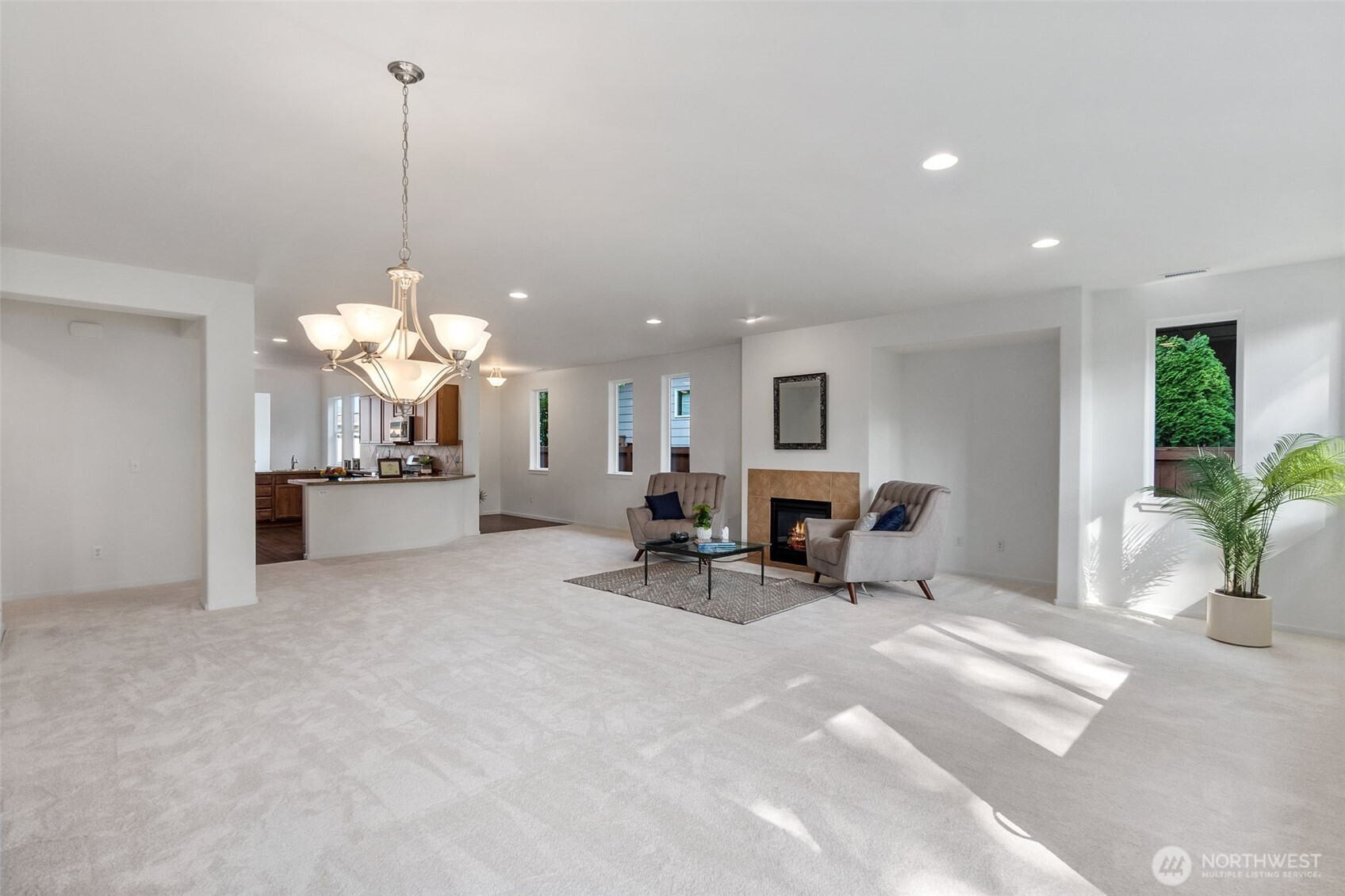 8231 Orcas Loop Northeast Lacey, WA 98516 - Photo 2 of 23 a view of a livingroom with furniture and a floor to ceiling window