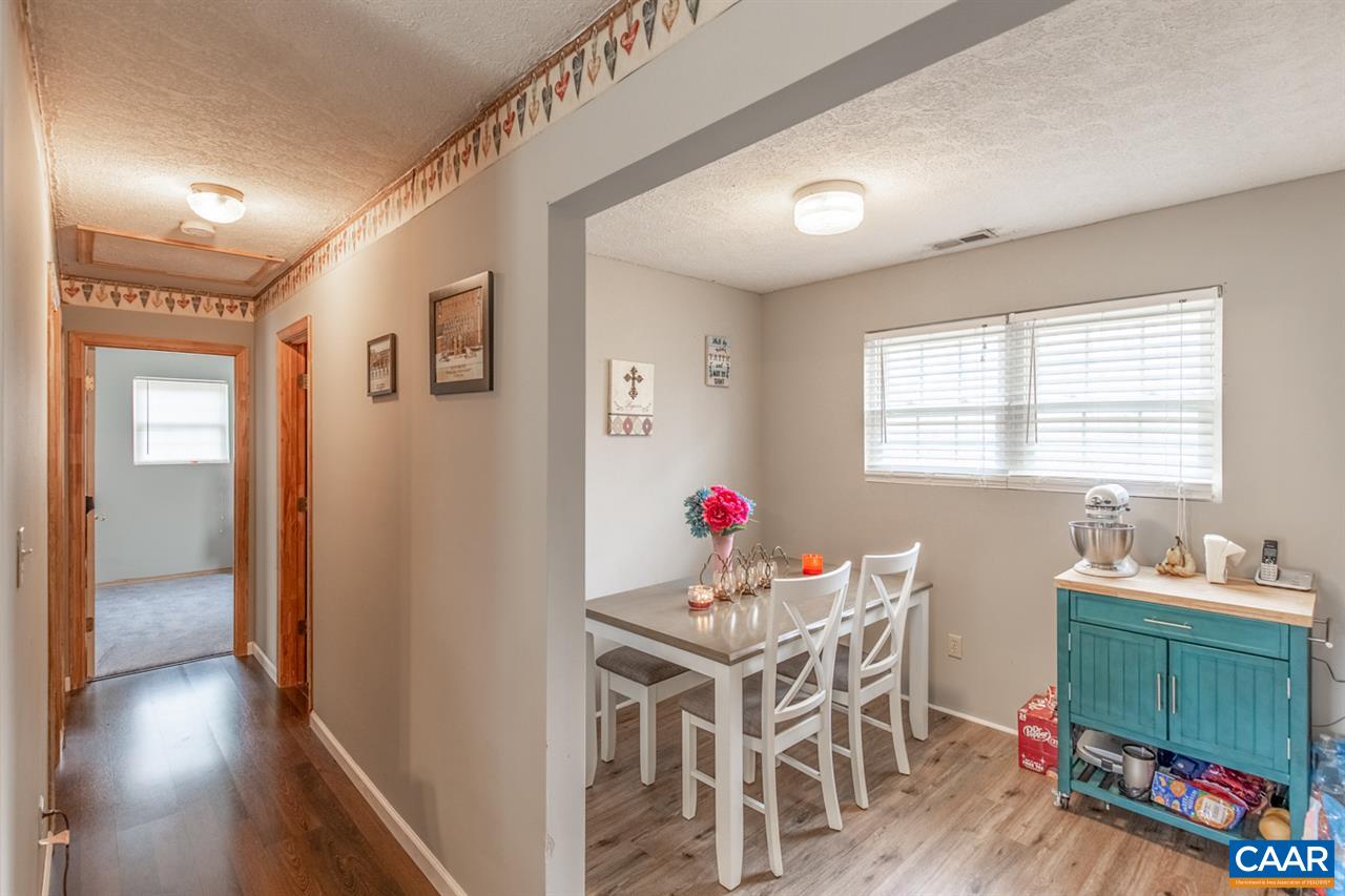 1504 Adial Road Faber, VA 22938 - Photo 11 of 22 a dining room with furniture and a window
