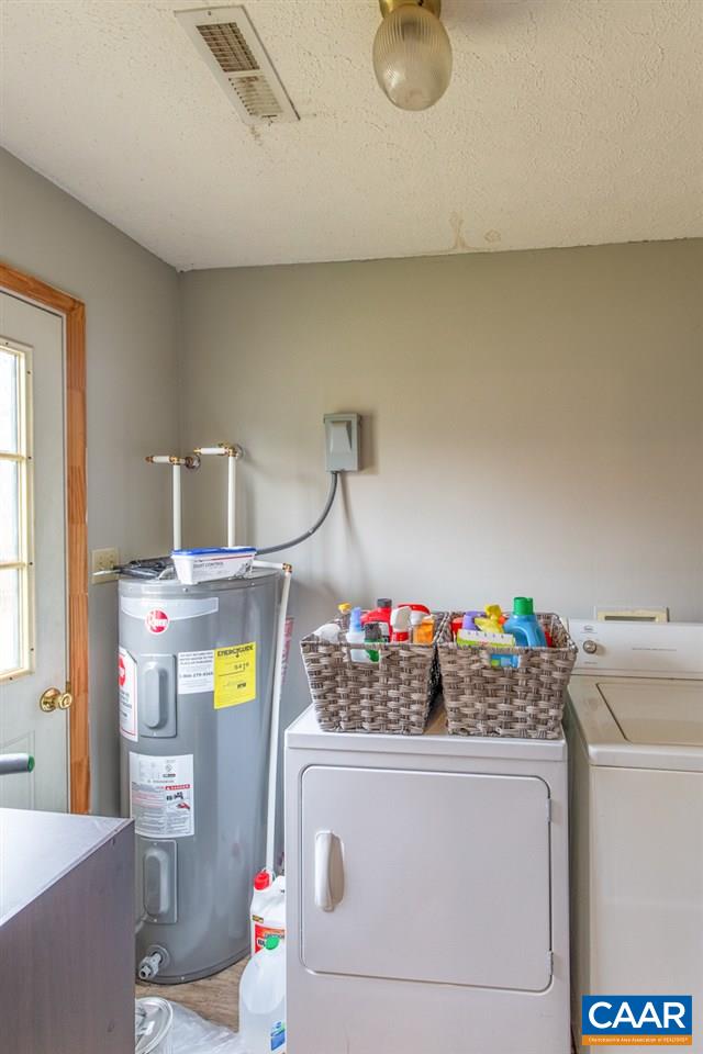 1504 Adial Road Faber, VA 22938 - Photo 16 of 22 a bathroom with a sink and a mirror