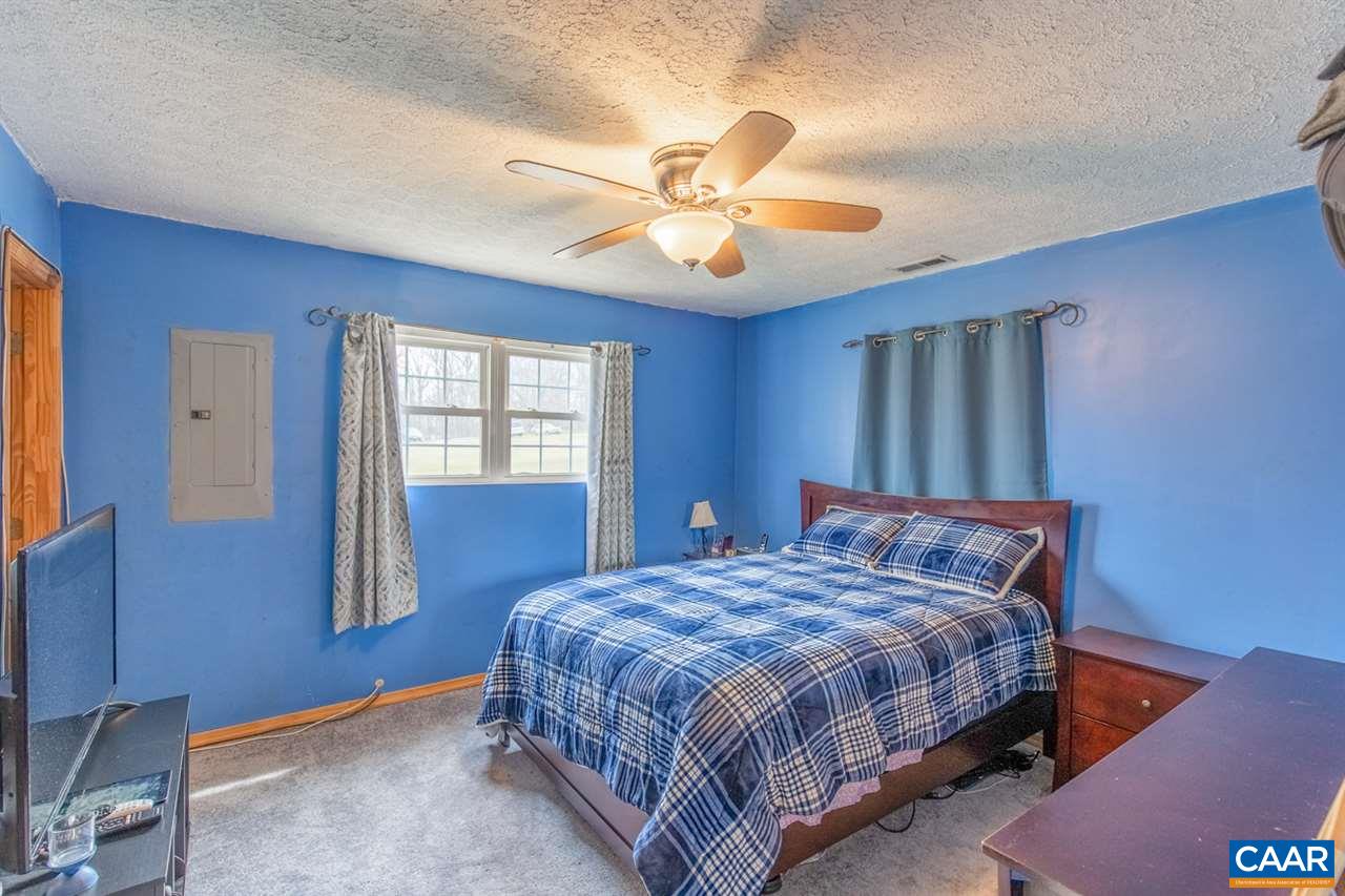 1504 Adial Road Faber, VA 22938 - Photo 17 of 22 a bedroom with a bed and window