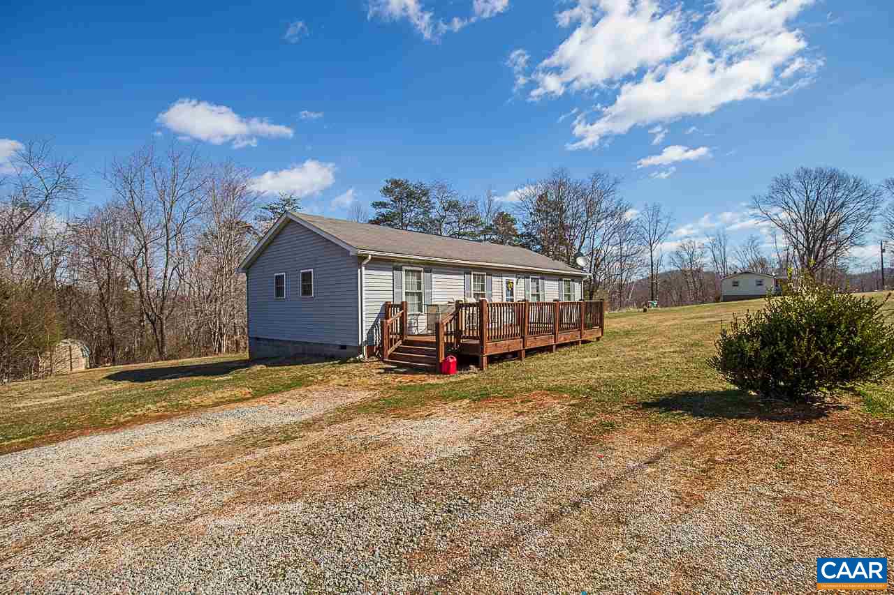 1504 Adial Road Faber, VA 22938 - Photo 2 of 22 a view of a house with a yard covered in snow