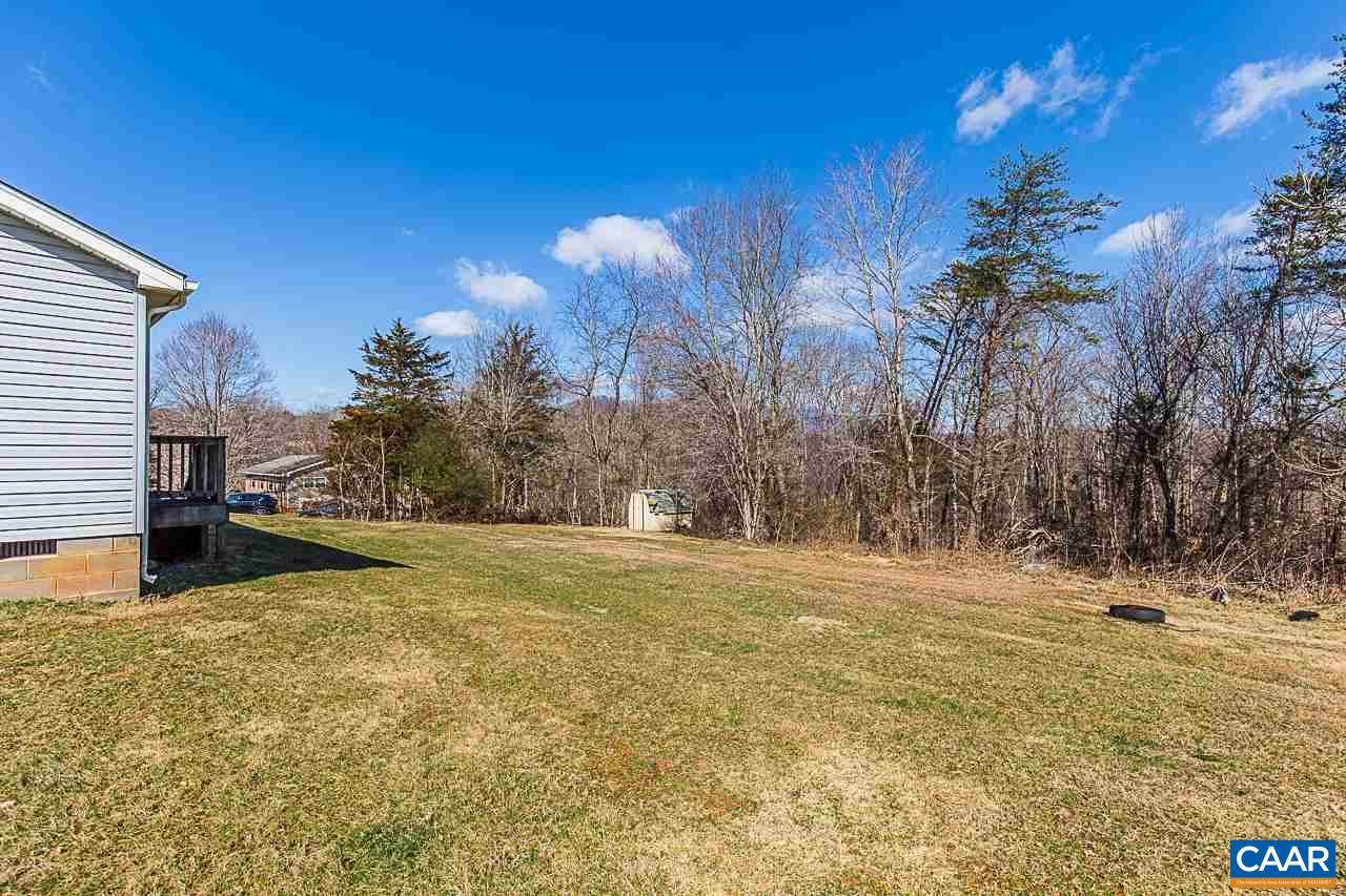 1504 Adial Road Faber, VA 22938 - Photo 4 of 22 a view of a yard with a tree