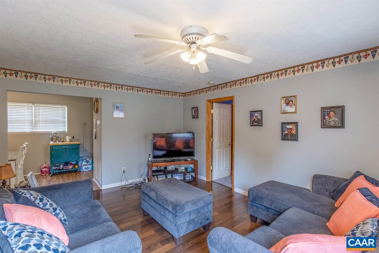 1504 Adial Road Faber, VA 22938 - Photo 8 of 22 a living room with furniture and a flat screen tv