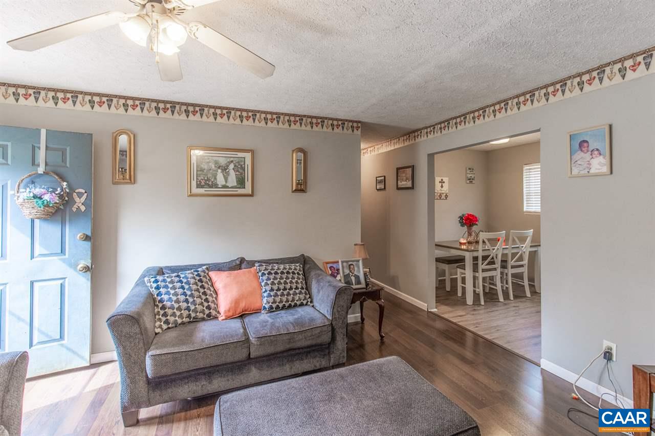 1504 Adial Road Faber, VA 22938 - Photo 9 of 22 a living room with furniture and a chandelier