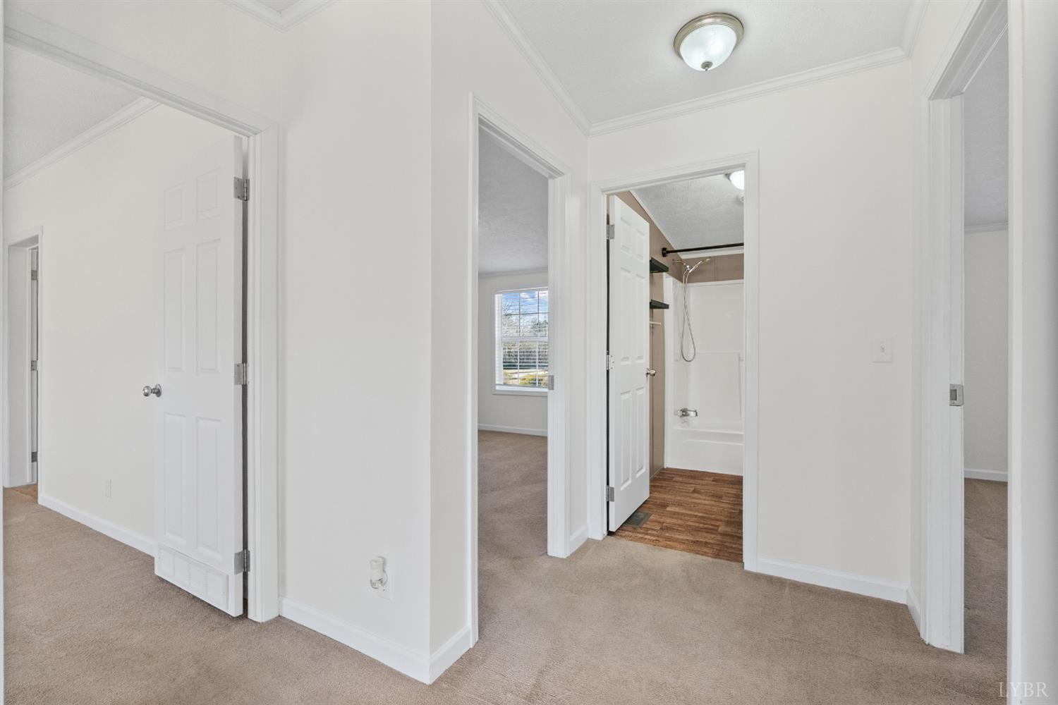 13116 Brookneal Highway Gladys, VA 24554 - Photo 16 of 34 a view of a hallway with closet and a bathroom