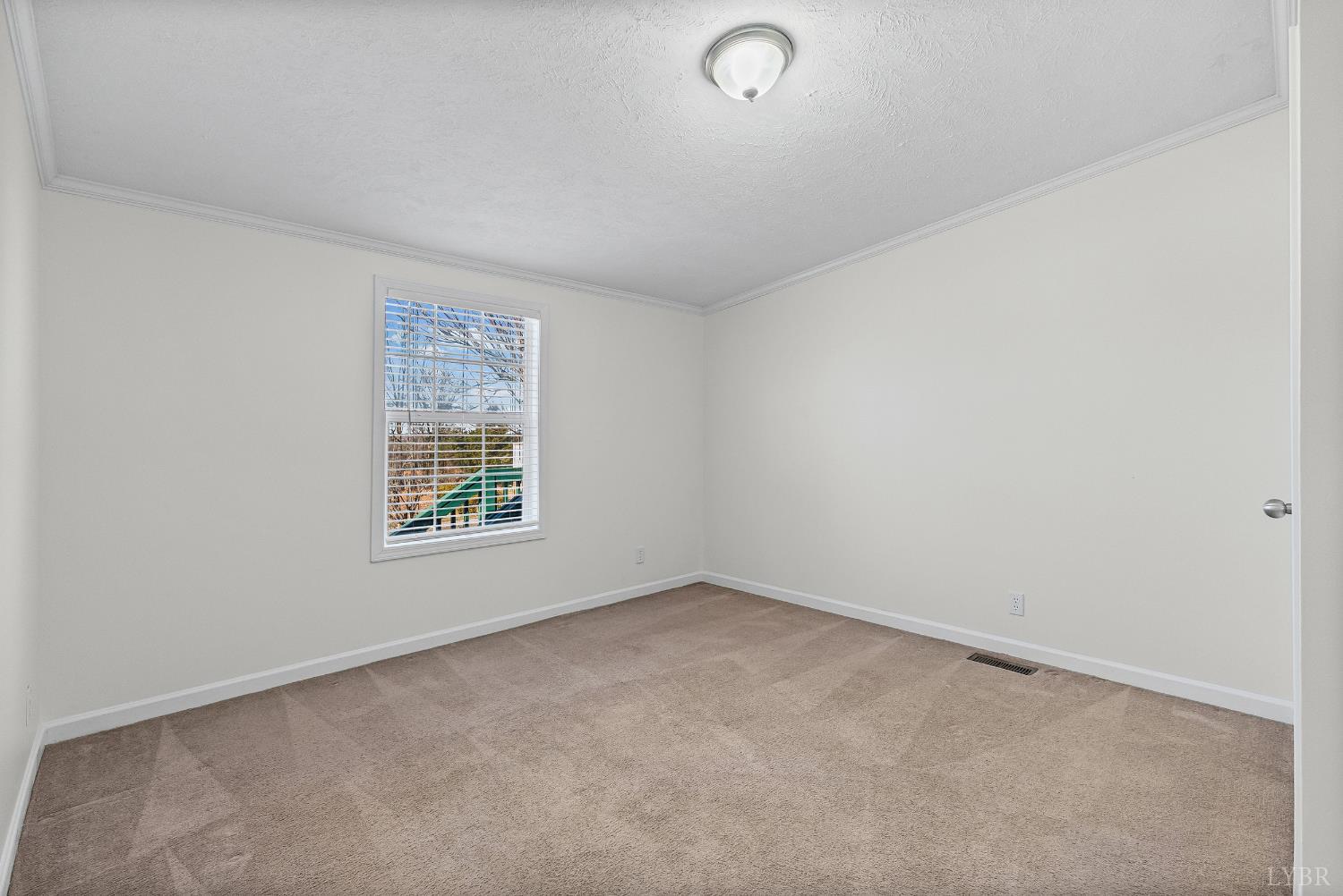13116 Brookneal Highway Gladys, VA 24554 - Photo 19 of 34 an empty room with a window