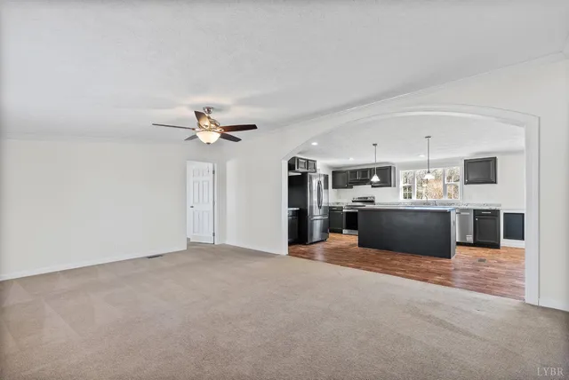 a view of kitchen with cabinets