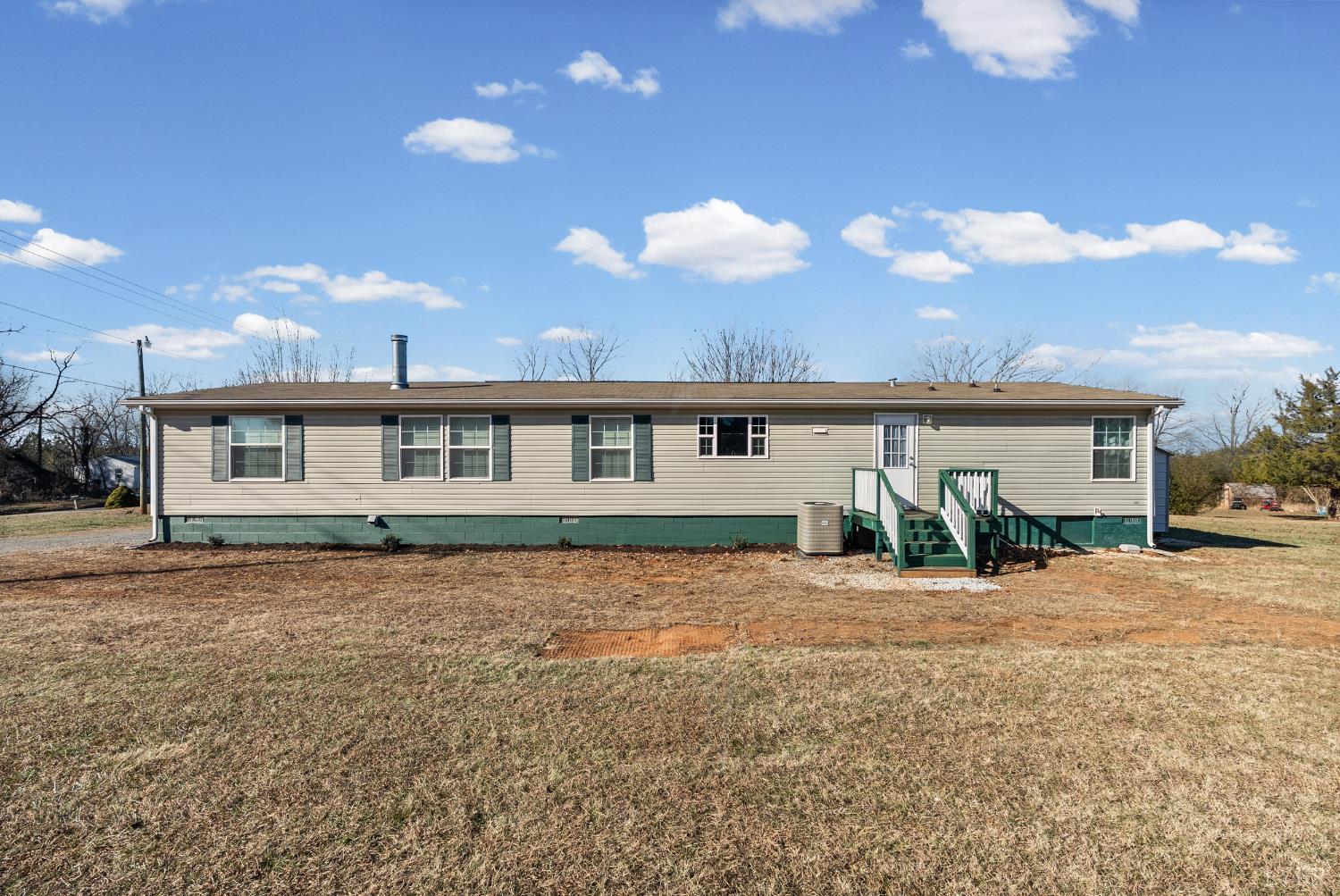 13116 Brookneal Highway Gladys, VA 24554 - Photo 25 of 34 a front view of a house with a yard and outdoor space