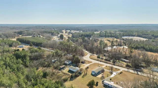 an aerial view of residential house with parking space