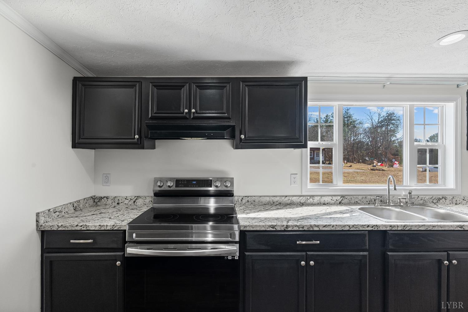 13116 Brookneal Highway Gladys, VA 24554 - Photo 8 of 34 a kitchen with stainless steel appliances granite countertop a sink and a stove