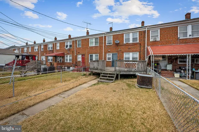 a view of a house with swimming pool