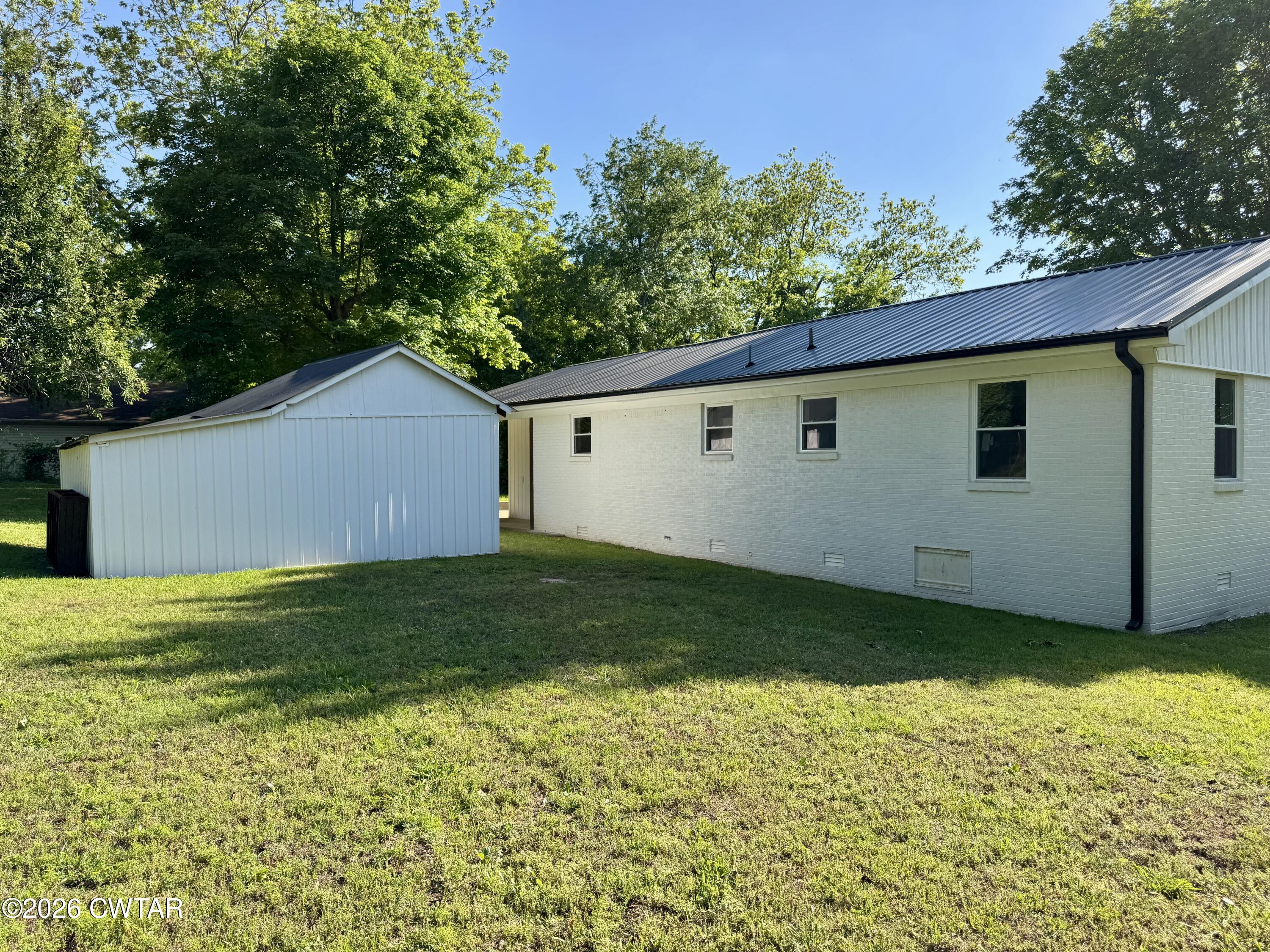 98 Reagan Road Dyersburg, TN 38024 - Photo 11 of 31 a view of a backyard