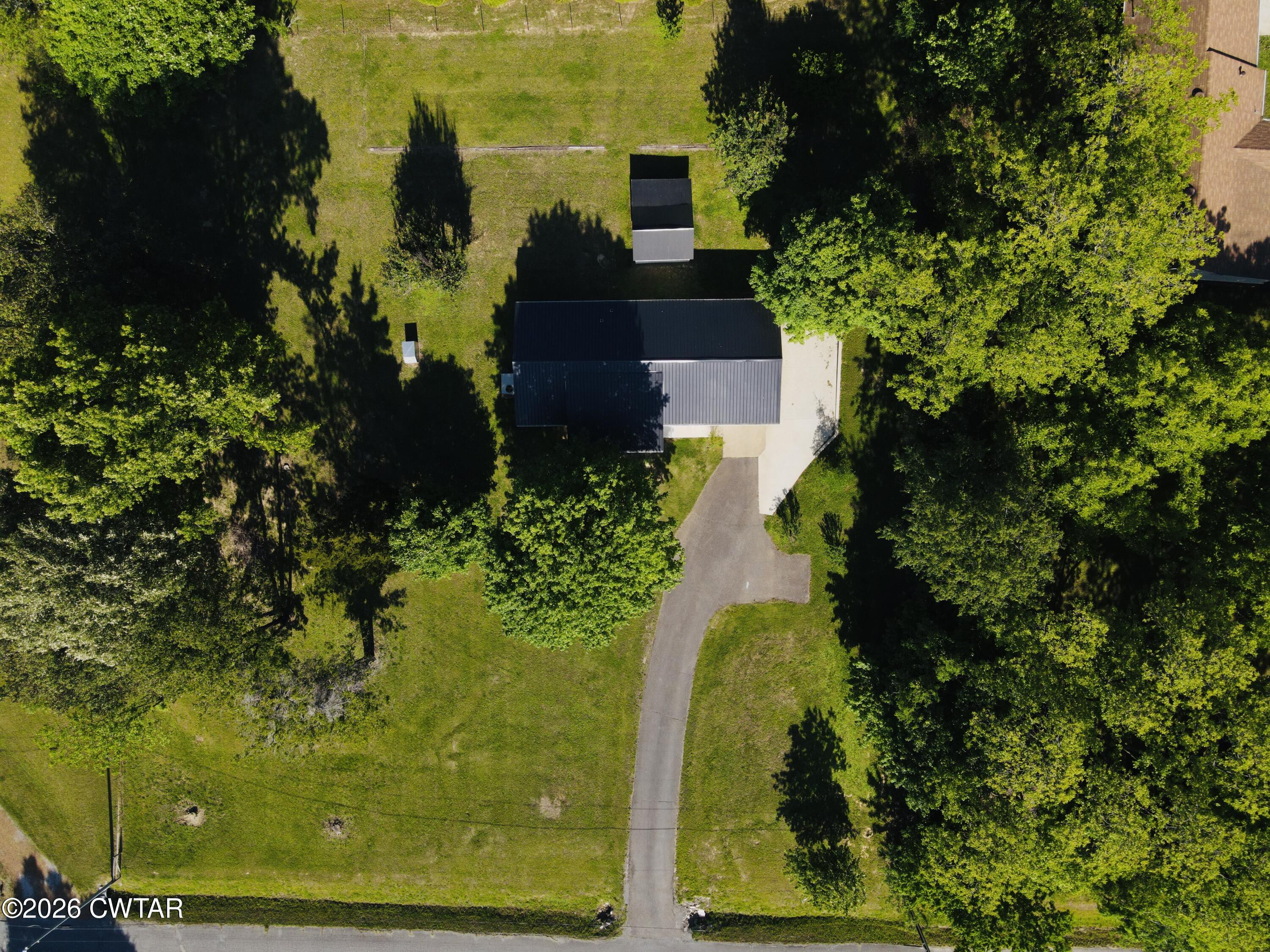 98 Reagan Road Dyersburg, TN 38024 - Photo 19 of 31 a view of a garden