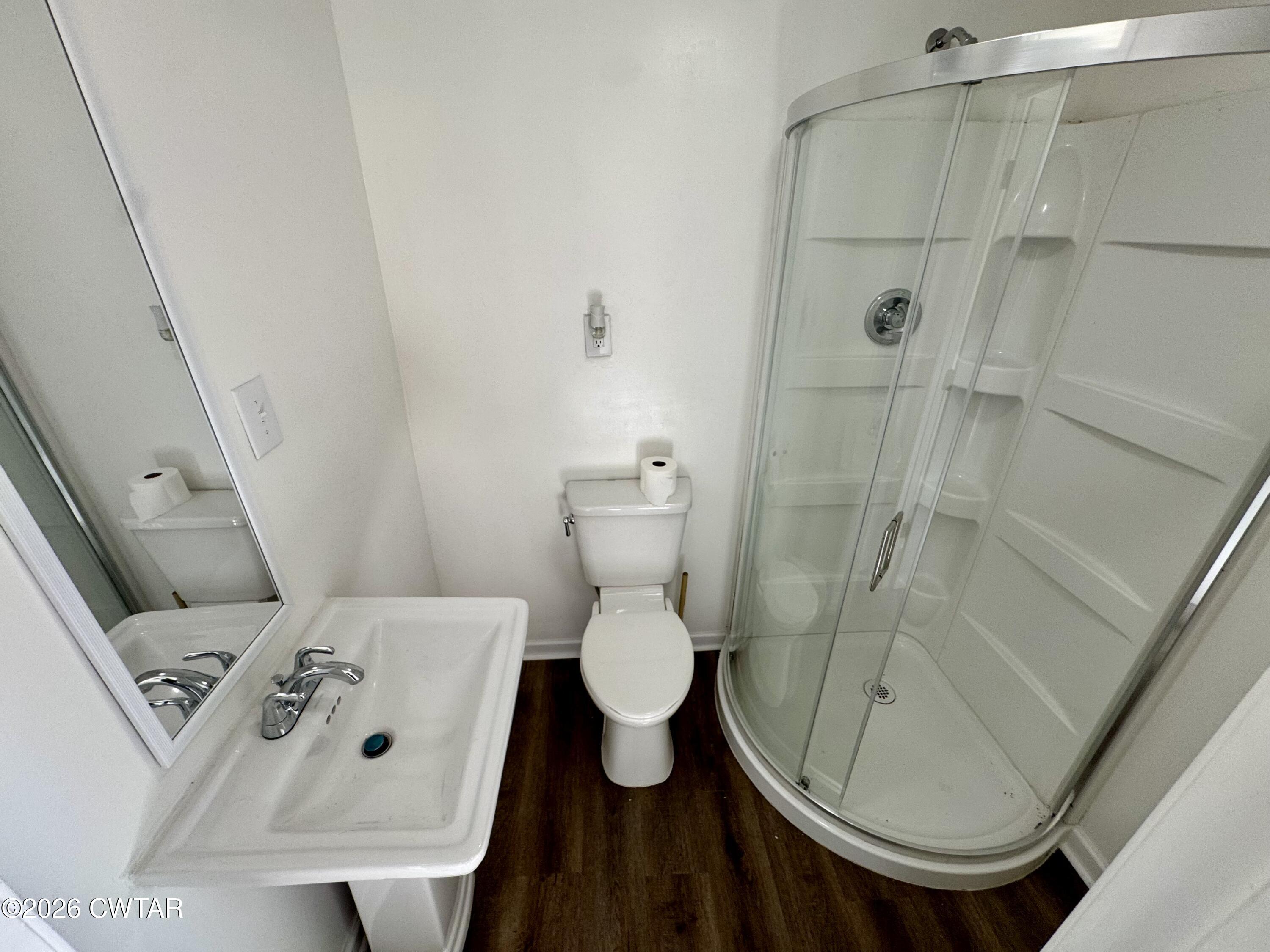 98 Reagan Road Dyersburg, TN 38024 - Photo 26 of 31 a bathroom with a toilet and a sink