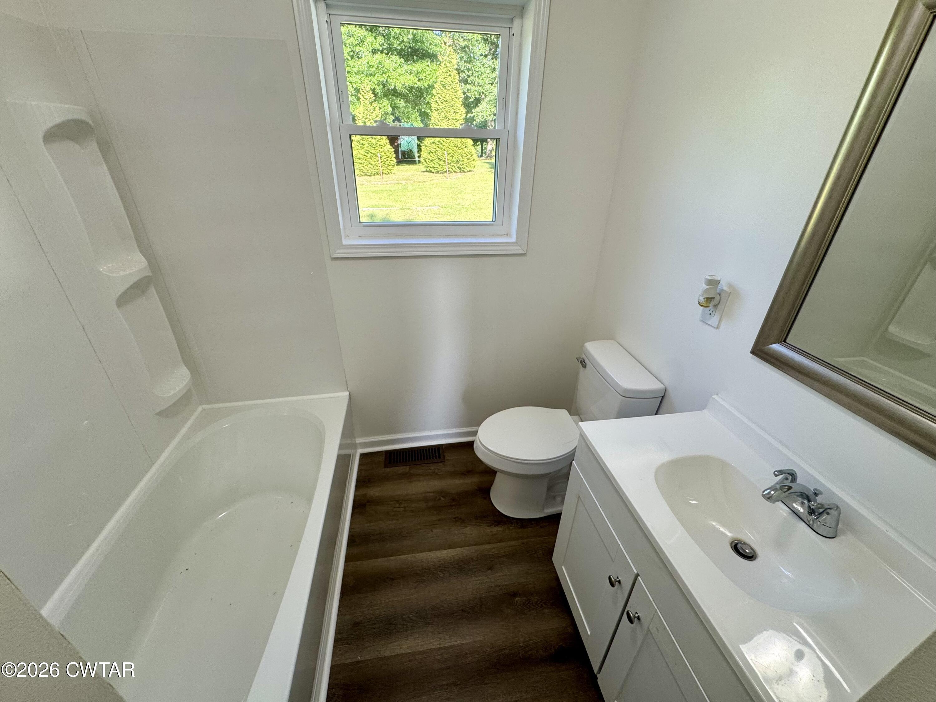 98 Reagan Road Dyersburg, TN 38024 - Photo 28 of 31 a bathroom with a sink and a toilet