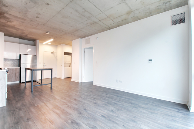 Undisclosed Address Chicago, IL 60657 - Photo 13 of 17 a view of empty room with wooden floor